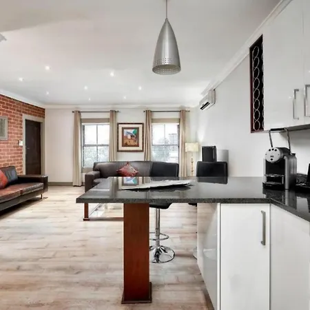 Menlyn Boutique Hotel Pretoria Exterior photo A modern apartment in London