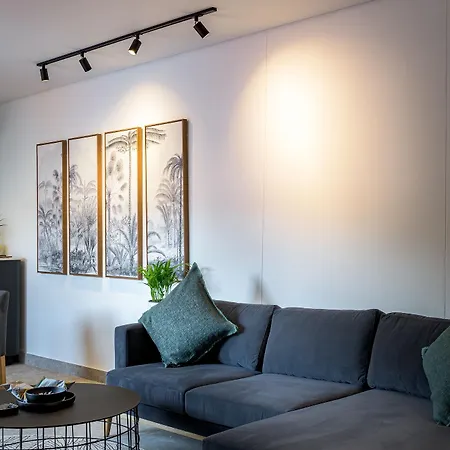 Menlyn Boutique Hotel Pretoria Exterior photo A living room with a wall mounted LED light